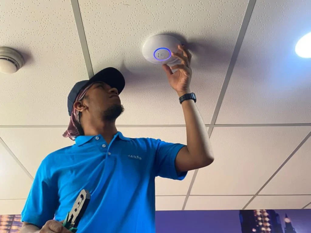 Local Technician installing office WiFi in Malaysia